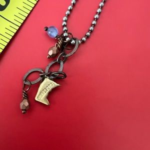 Minnesota local artist created charm necklace